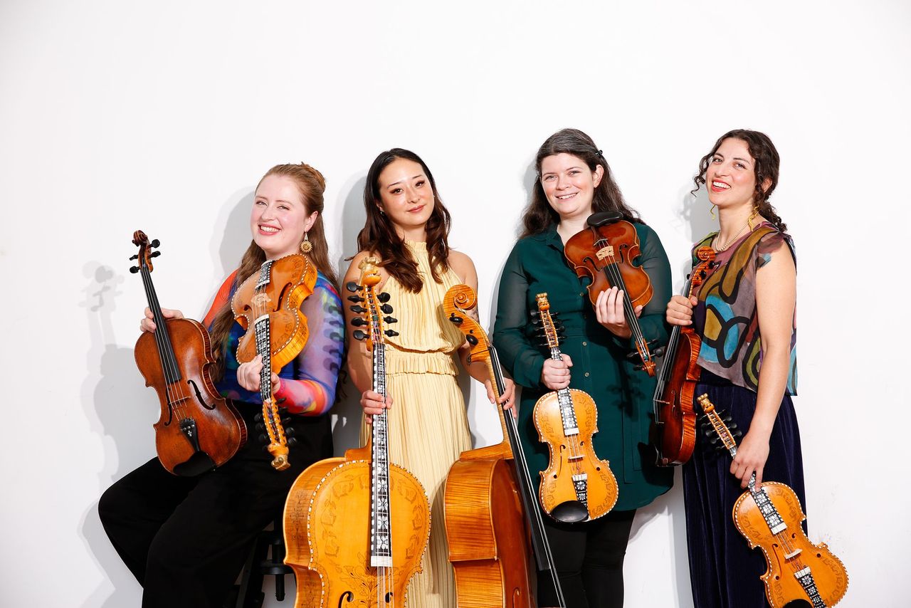 Bergamot Quartet holding their Classical and Hardanger instruments
