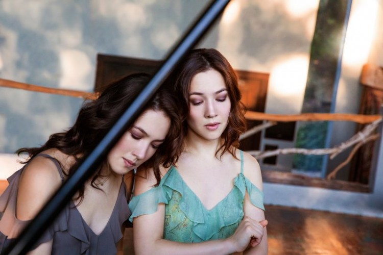 Christina and Michelle Naughton at the piano