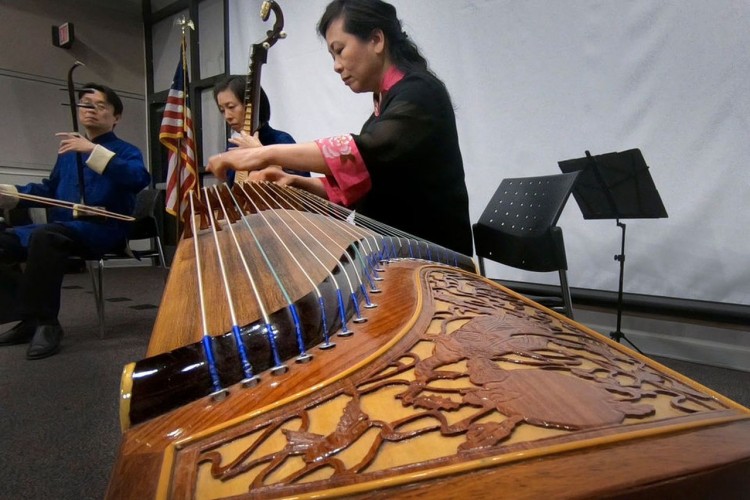 Musicians (from left) Wang Guowei on erhu; Sun Li on pipa and Wang Junling, on zheng.