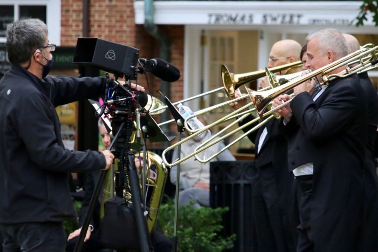 The brass section of the Princeton Symphony Orchestra is videotaped in Palmer Square
