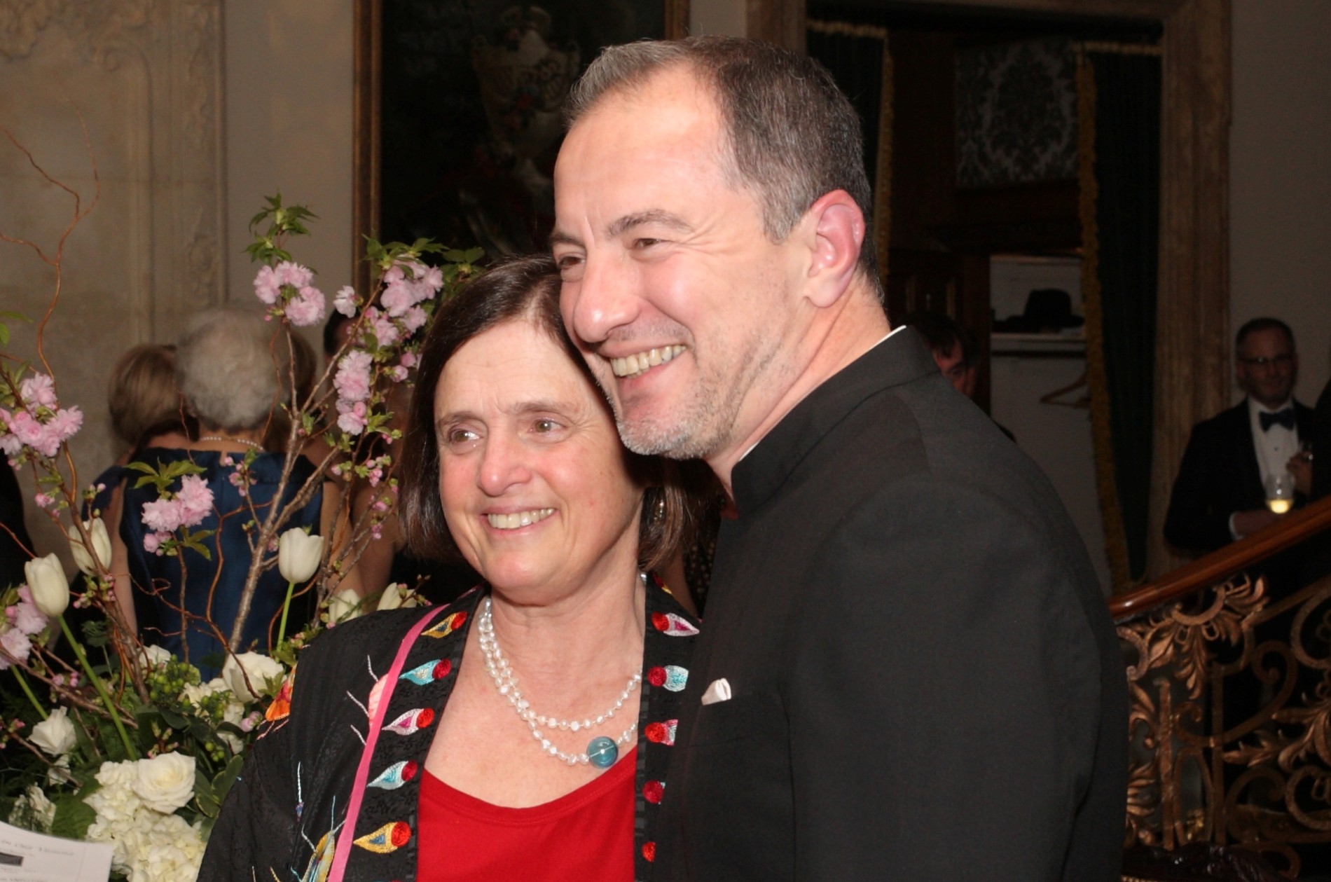 Rossen Milanov and Melanie Clarke pose for a photo