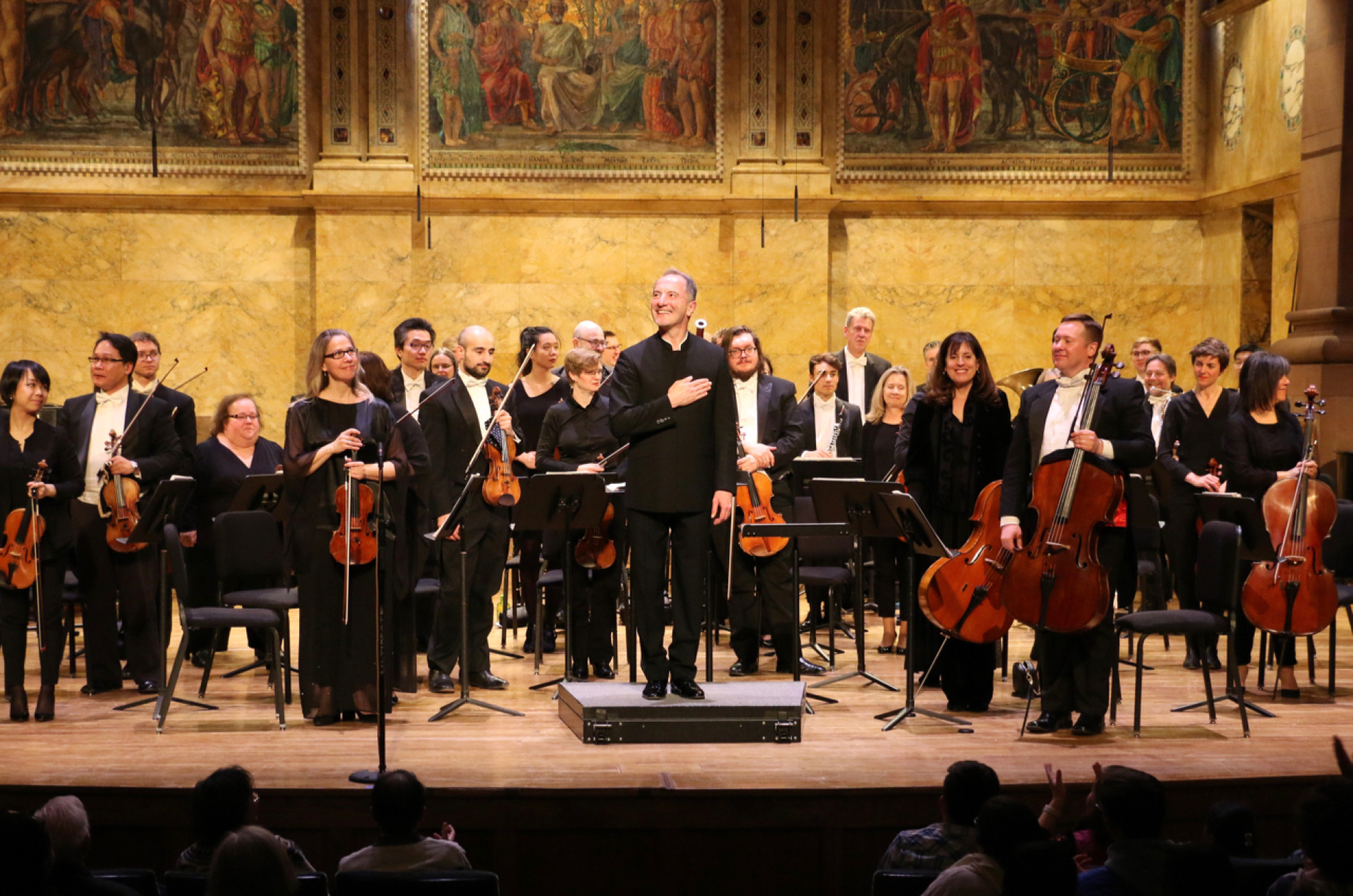 Maestro Rossen Milanov and Princeton Symphony Orchestra musicians on stage at Richardson Auditorium.